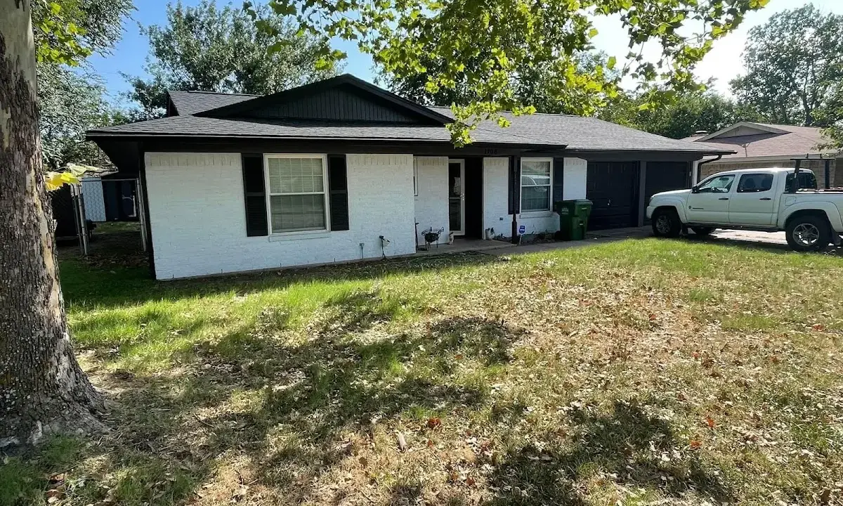 Professional roofing crew working on a residential roof in Sabattus